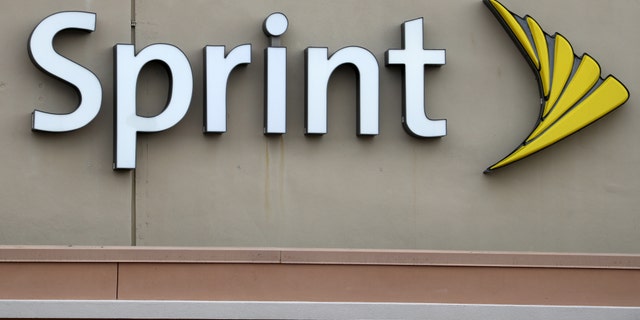 File photo: A Sprint store logo is pictured on a building in Boca Raton, Florida March 19, 2016. (REUTERS/Carlo Allegri)