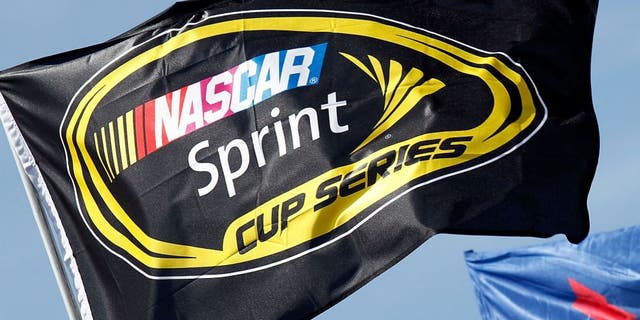 DOVER, DE - MAY 16: The NASCAR Sprint Cup Series Flag and Sunoco Flag during the NASCAR Sprint Cup Series Autism Speaks 400 at Dover International Speedway on May 16, 2010 in Dover, Delaware. (Photo by Jason Smith/Getty Images for NASCAR)
