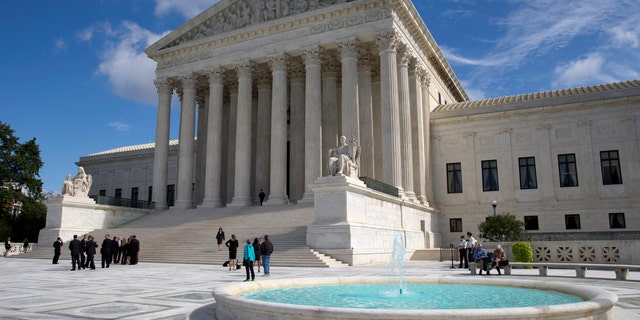 The Supreme Court is seen in Washington, Monday, Oct. 5, 2015. The Supreme Court is starting a new term that promises a steady stream of divisive social issues, and also brighter prospects for conservatives who suffered more losses than usual in recent months. (AP Photo/Carolyn Kaster)