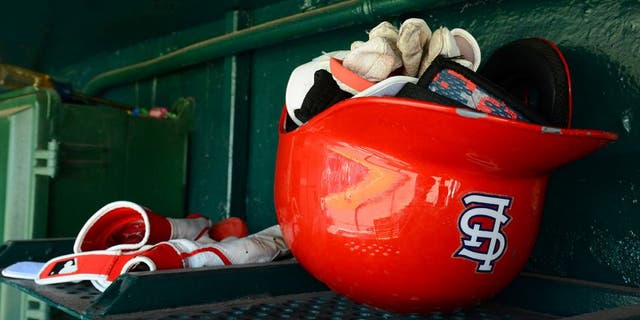 LAKELAND, FL - MARCH 03: A detailed view of a St. Louis Cardinals batting helmet sitting in the dugout prior to the spring training game against the Detroit Tigers at Joker Marchant Stadium on March 3, 2014 in Lakeland, Florida. The Tigers defeated the Cardinals 8-5. (Photo by Mark Cunningham/MLB Photos via Getty Images)