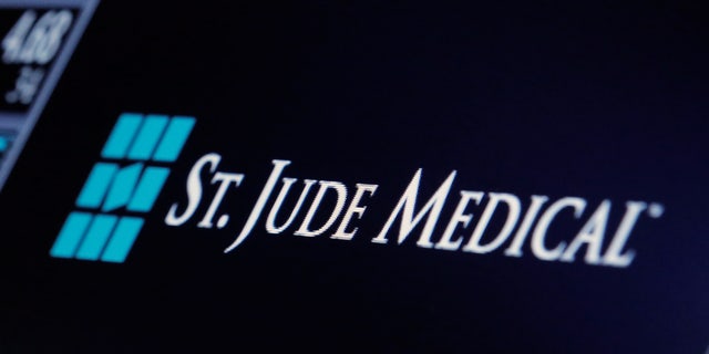 The ticker and trading information for St. Jude Medical is displayed where the stock is traded on the floor of the New York Stock Exchange (NYSE) in New York City, U.S., April 28, 2016.
