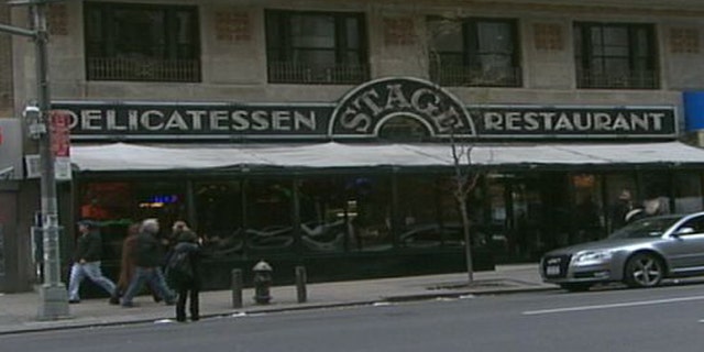 Visitors of the famous diner in Times Square were greeted with a hand-written sign on the door that said "Thanks for 75 years!"