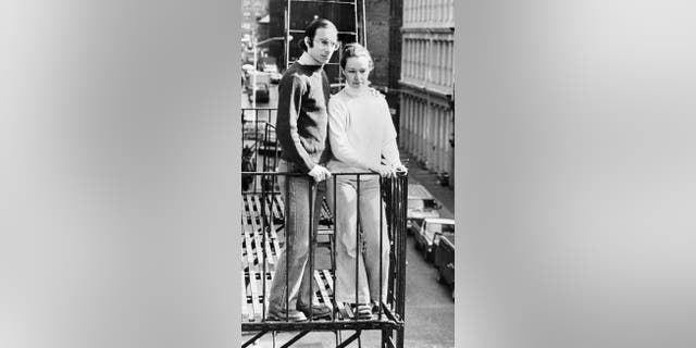 Stan and Julie Patz on the second-floor fire escape of the of their SoHo loft in 1980.