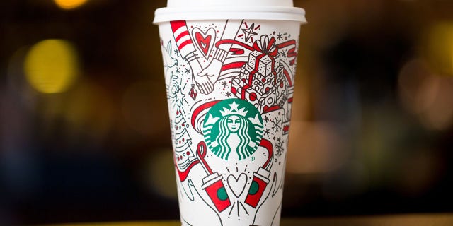 The hands above the Starbucks logo on the holiday cups are causing a stir for possibly belonging to lesbians.