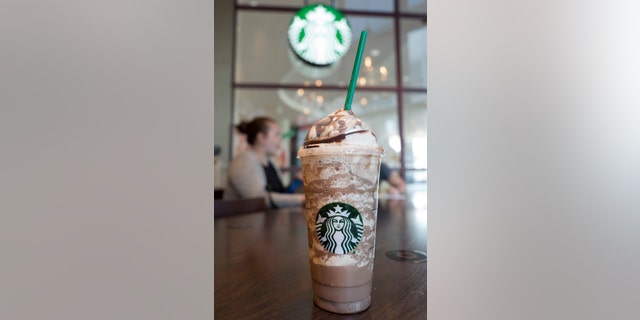 A Triple Mocha Frappuccino with 2-percent milk and whipped cream contains 390 calories and 51 grams of sugar.
