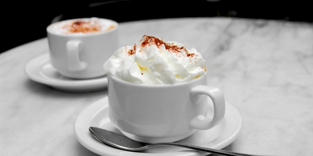 Two cups of coffee on a table