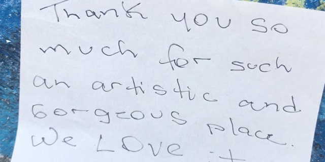The homeowners said it’s normal to hear shouts of support from passersby and see dozens of fans posing for pictures in front of the home. Some leave notes of admiration, like the one above.