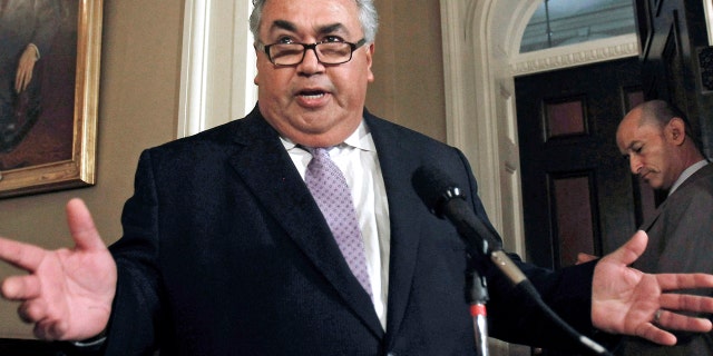FILE - In this June 10, 2013 file photo, then-California State Sen. Ron Calderon, D-Montebello, discusses the FBI raid on his Capitol office in Sacramento.