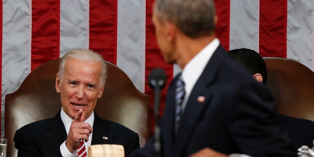 Jan. 12, 2016: Vice President Joe Biden points at President Barack Obama during the State of the Union address to a joint session of Congress on Capitol Hill in Washington. (AP Photo/Evan Vucci, Pool)