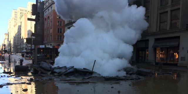 The steam pipe explosion left a large crater on Fifth Avenue and 21st Street.