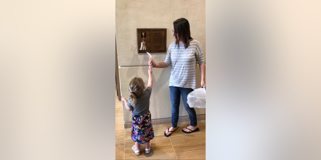 Stephanie shared a photo of her and her daughter ringing a "chemo bell" signaling the end of treatment.