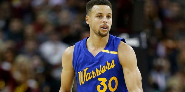 Dec 25, 2016; Cleveland, OH, USA; Golden State Warriors guard Stephen Curry (30) brings the ball up court against the Cleveland Cavaliers at Quicken Loans Arena. Cleveland defeats Golden State 109-108. Mandatory Credit: Brian Spurlock-USA TODAY Sports