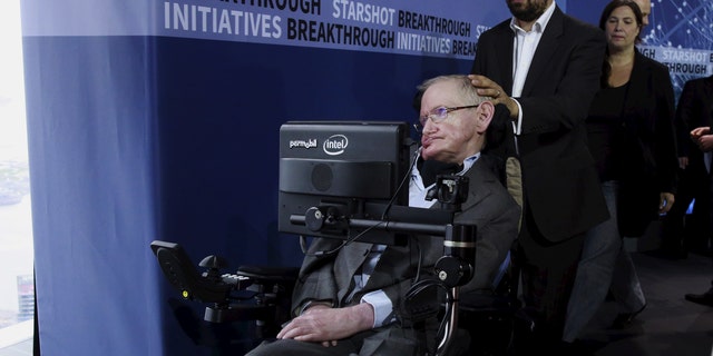 Physicist Stephen Hawking exits the stage during an announcement of the Breakthrough Starshot initiative with investor Yuri Milner in New York April 12, 2016. REUTERS/Lucas Jackson - RTX29N6G