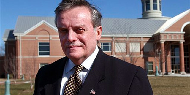 In this March 15, 2004 file photo, Harrisburg Mayor Stephen R. Reed stands in front of the National Civil War Museum in Harrisburg, Pa. Reed was charged Tuesday, July 14, 2015, with hundreds of counts of corruption after an investigation of city finances during his 28 years in office.