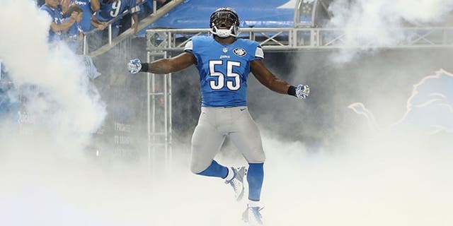 DETROIT, MI - SEPTEMBER 21: Stephen Tulloch # 55 of the Detroit Lions runs onto the field during player introductions prior to the start of the game against the Green Bay Packers at Ford Field on September 21, 2014 in Detroit, Michigan. The Lions defeated the Packers 19-7. (Photo by Leon Halip/Getty Images) *** Local Caption *** Stephen Tulloch