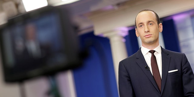 Senior White House Advisor Stephen Miller waits to go on the air in the White House Briefing Room in Washington, U.S., February 12, 2017. REUTERS/Joshua Roberts - RTSYA17