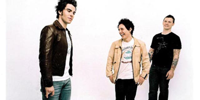 Stereophonics drummer Stuart Cable (c) died at age 40.