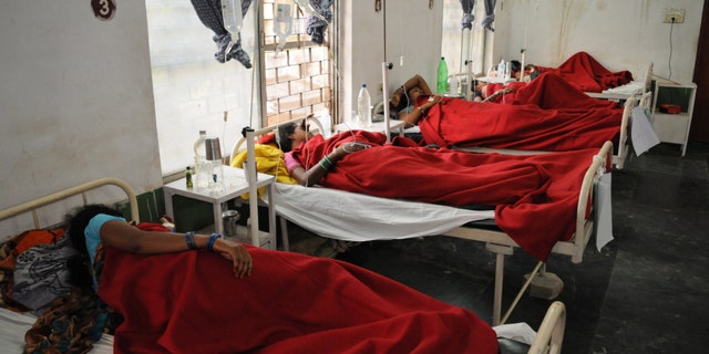 Nov. 12, 2014: Indian women who underwent sterilization surgeries receive treatment at the District Hospital in Bilaspur, in the central Indian state of Chhattisgarh after at least a dozen died and many others fell ill following similar surgery.