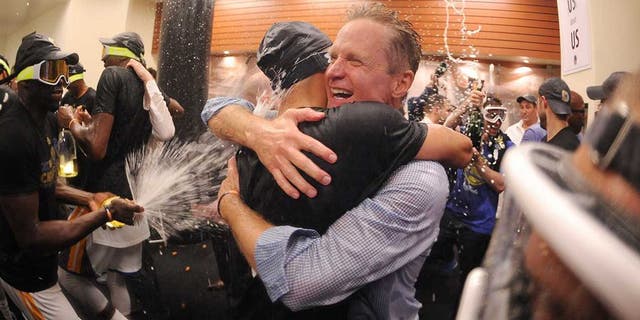 OAKLAND, CA - JUNE 12: Head Coach Steve Kerr of the Golden State Warriors celebrates in the locker room after defeating the Cleveland Cavaliers in Game Five of the 2017 NBA Finals on June 12, 2017 at Oracle Arena in Oakland, California. NOTE TO USER: User expressly acknowledges and agrees that, by downloading and or using this photograph, user is consenting to the terms and conditions of Getty Images License Agreement. Mandatory Copyright Notice: Copyright 2017 NBAE (Photo by: Noah Graham/NBAE via Getty Images)