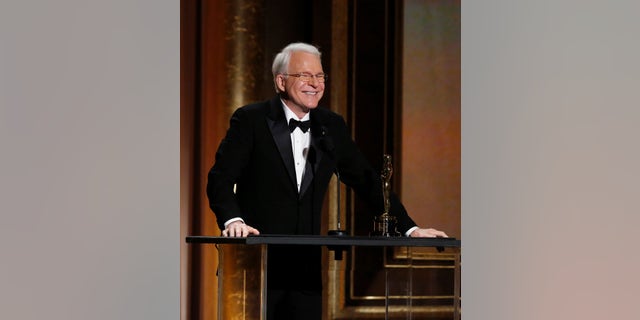 November 16, 2013. Actor Steve Martin smiles as he accepts an Honorary Award at the 5th Annual Academy of Motion Picture Arts and Sciences Governors Awards at The Ray Dolby Ballroom in Hollywood, California.