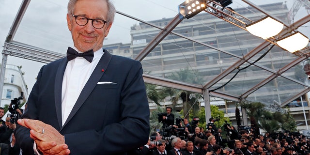May 19, 2013. Director Steven Spielberg, Jury President of the 66th Cannes Film Festival, poses on the red carpet as he arrives for the screening of the film "Inside Llewyn Davis" in competition during the 66th Cannes Film Festival in Cannes.