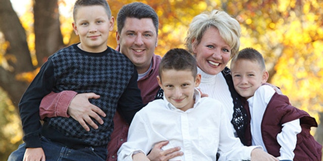 Erin Stevens, founder of Strip Church in Nashville, appears in an undated photograph with her husband, Todd, and the couple's three children. Stevens said launching the ministry has been her 'greatest accomplishment' aside from raising Elijah, 13; Daniel, 10; and Levi, 7. (Courtesy: Erin Stevens)