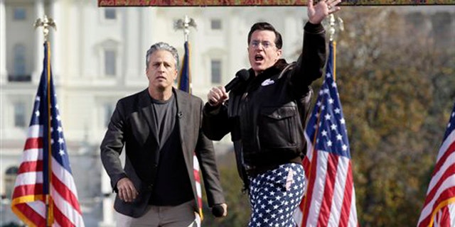 Oct. 30, 2010: Comedians Stephen Colbert, right, and Jon Stewart perform in front of the U.S. Capitol during their Rally to Restore Sanity and/or Fear on the National Mall in Washington.
