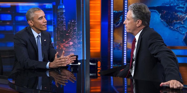 President Barack Obama, left, talks with Jon Stewart, host of "The Daily Show" during a taping, on Tuesday, July 21, 2015, in New York.