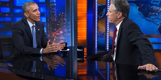 President Barack Obama, left, talks with Jon Stewart, host of "The Daily Show" during a taping, on Tuesday, July 21, 2015, in New York.