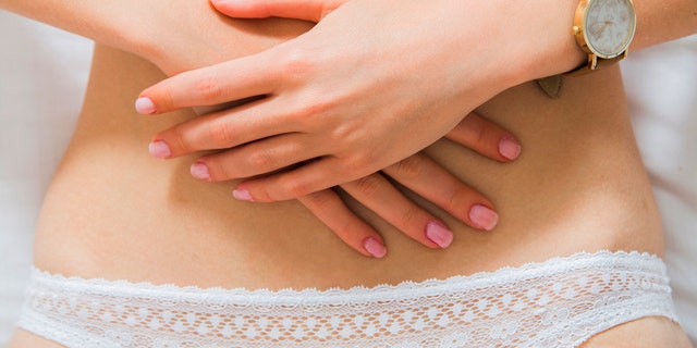 sti uti period cramps sexual health woman istock medium