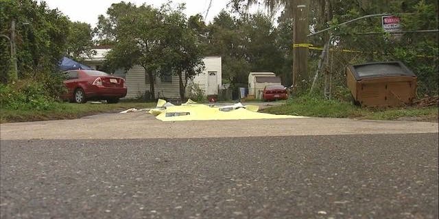 Cops found three people dead and a fourth person wounded at a Lakeland home.
