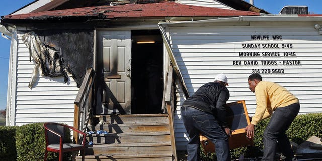 Damage to the New Life Missionary Baptist Church in St. Louis after a fire. (J.B. Forbes/St. Louis Post-Dispatch via AP)