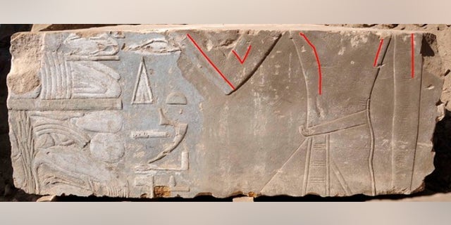 A stone block found on Egypt's Elephantine Island shows Queen Hatshepsut as a female (highlighted by red lines). Later images of the pharaoh portrayed her as a male king.