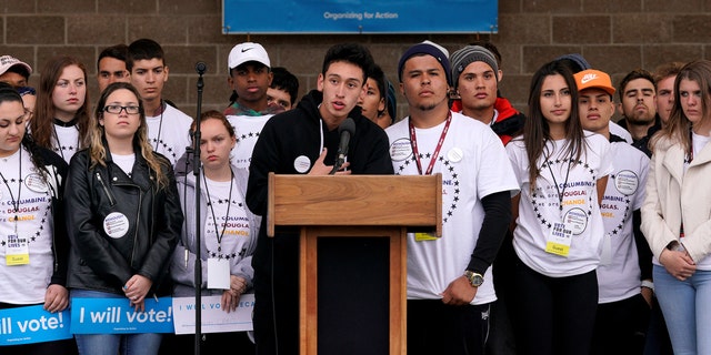 Marjory Stoneman Douglas High School survivor Carlos "Carlitos" Rodriguez speaks as teens kick off a voter registration rally, a day ahead of the 19th anniversary of the massacre at Columbine High School, in Littleton, Colorado, U.S., April 19, 2018.