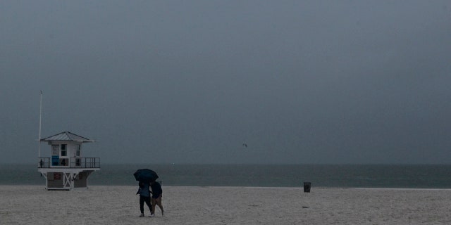 Rain falls on Clearwater Beach by Pier 60 early Sunday morning May 27, 2018, as northbound Subtropical Storm Alberto looms in the gulf to the southwest. as northbound Subtropical Storm Alberto looms in the gulf to the southwest.