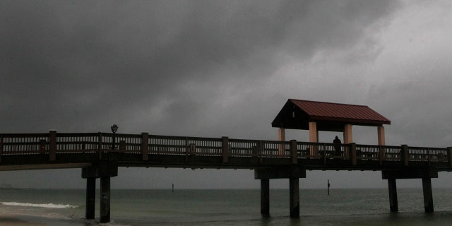 Rain falls on Clearwater Beach by Pier 60 early Sunday morning May 27, 2018, as northbound Subtropical Storm Alberto looms in the gulf to the southwest.