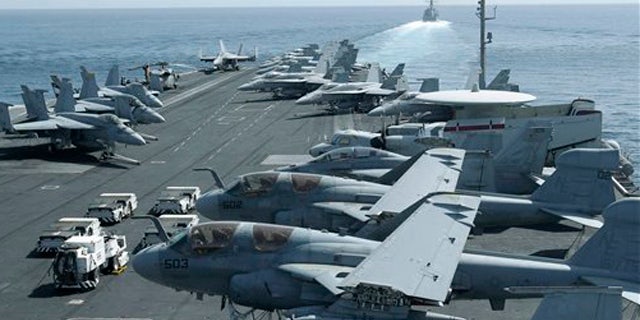 Aircraft parked on the flight deck of the USS Abraham Lincoln in this 2012 photo.