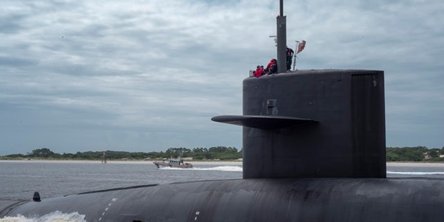 Feb 6, 2013: The Ohio-class ballistic missile submarine USS Tennessee transits the St. Marys Channel as it departs Naval Submarine Base Kings Bay, Georgia in this handout photo. (Reuters)