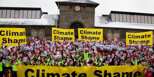 A handout shows members of the TckTckTck coalition protesting the heads of state at the Climate Change Conference in Copenhagen Dec. 18. (Reuters Photo)