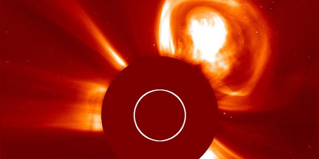 A gigantic solar eruption shoots out from the sun -- straight towards the Red Planet.