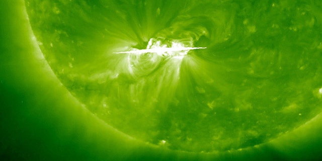 This image of the active sunspot group 1121 on the sun shows the solar hotspot as a bright white region in the lower left as seen by the sun-watching SOHO space observatory on Nov. 5, 2010.