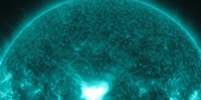 An X1.6 class solar flare flashes in the middle of the sun in this image taken September 10, 2014, in this image courtesy of NASA.