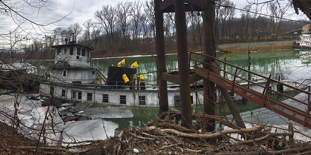 Coast Guard Marine Safety Unit Huntington members are responding to a sunken vessel with reports of discharging product near mile marker 8 on the Big Sandy River near Butler, W.V., on Wednesday