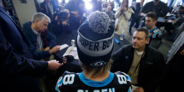 Carolina Panthers tight end Greg Olsen (88) answers questions during a press conference in preparation for the Super Bowl 50 football game Thursday Feb. 4, 2016 in San Jose, Calif. (AP Photo/Marcio Jose Sanchez)
