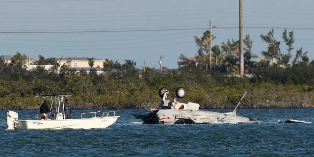 U.S. Navy personnel responded to the F/A-18 Super Hornet that crashed on its approach to Naval Air Station Key West in Florida on Wednesday.