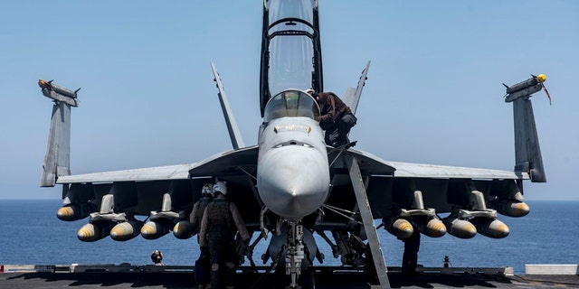 This undated photo shows an F/A-18E Super Hornet on board the USS George H.W. Bush in the Mediterranean Sea