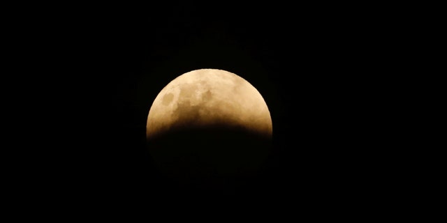 A full moon is seen during a lunar eclipse in Jakarta, Indonesia Jan. 31, 2018. (REUTERS/Darren Whiteside)