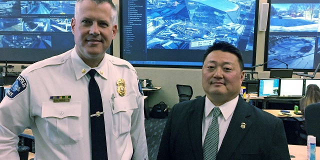 Minneapolis Police Commander Scott Gerlicher, left, and Homeland Security Investigations Special Agent in Charge Alex Khu, right, are heading up security preparations for the Super Bowl in Minnesota.