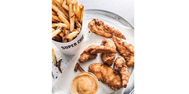 KFC’s parent company Yum Brands has quietly launched a new concept restaurant in Arlington, Texas that will take aim at Chick-fil-A.