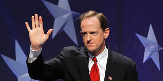 February 10, 2011: Sen. Pat Toomey, R-Pa. waves after addressing the Conservative Political Action Conference (CPAC) in Washington. Toomey is one of a dozen lawmakers on the debt supercommittee, given the task of producing a deficit-cutting plan of $1.5 trillion in savings over a decade.